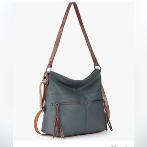 The Sak ashland bucket leather bag adjustable crossbody strap & shoulder straps